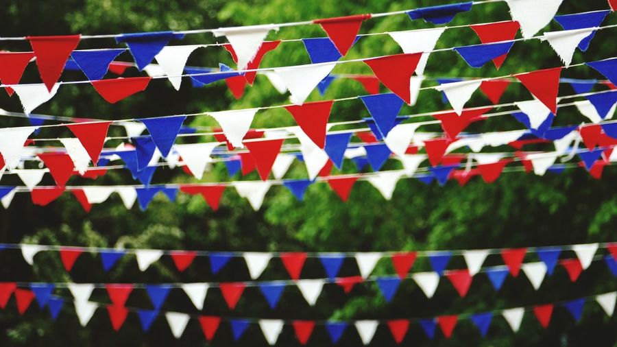 Low angle view of colorful bunting flags