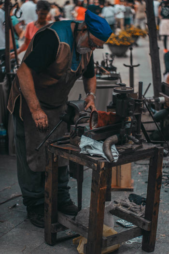 Man working at metal factory