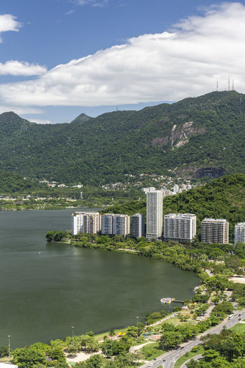 View to residential buildings in lagoa area and green mountains
