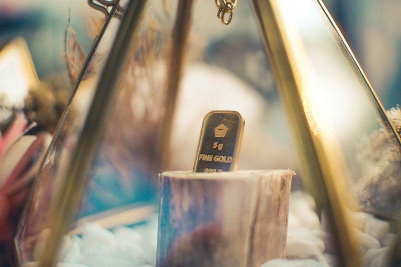 High angle view of fine gold in terrarium glass for sale
