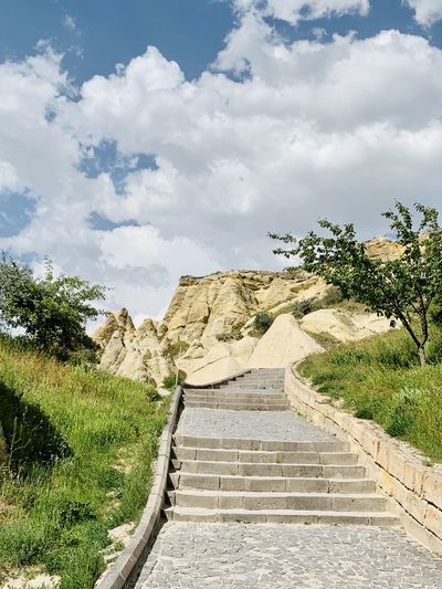 View of staircase against cloudy sky