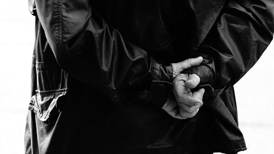 Close-up of man sitting outdoors