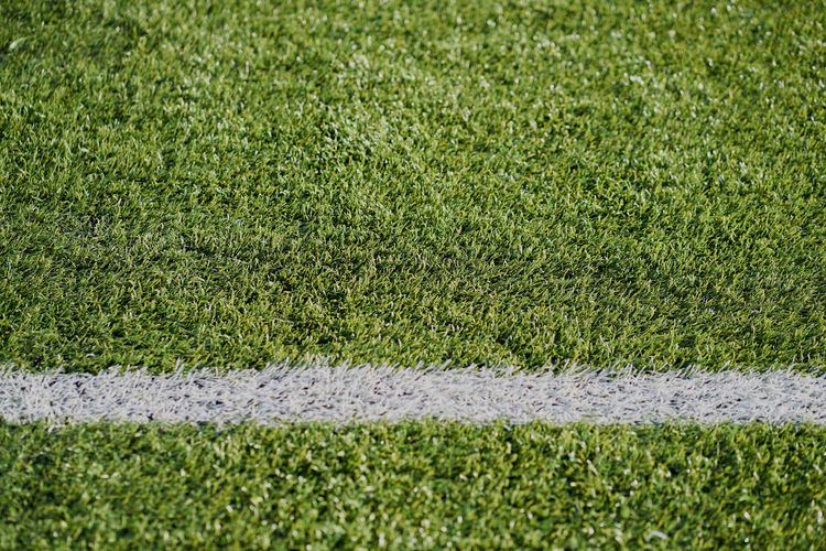 White line football corner on green field