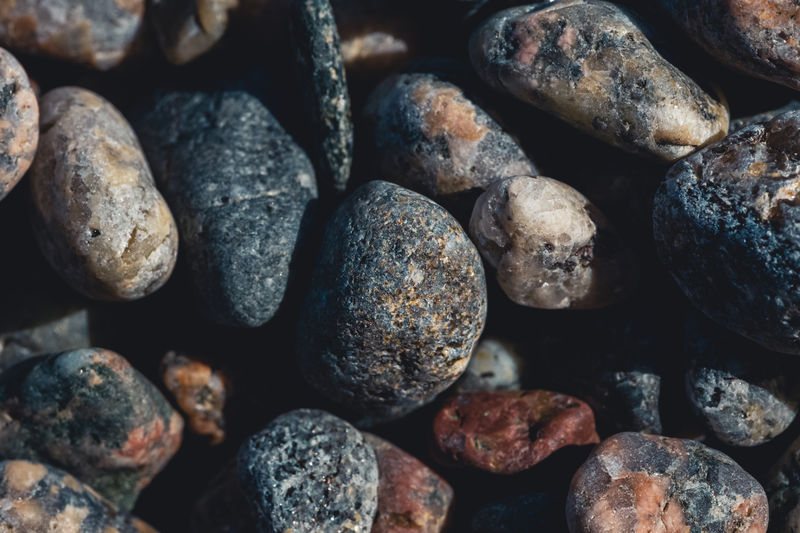 Full frame view of small pebbles on a beach