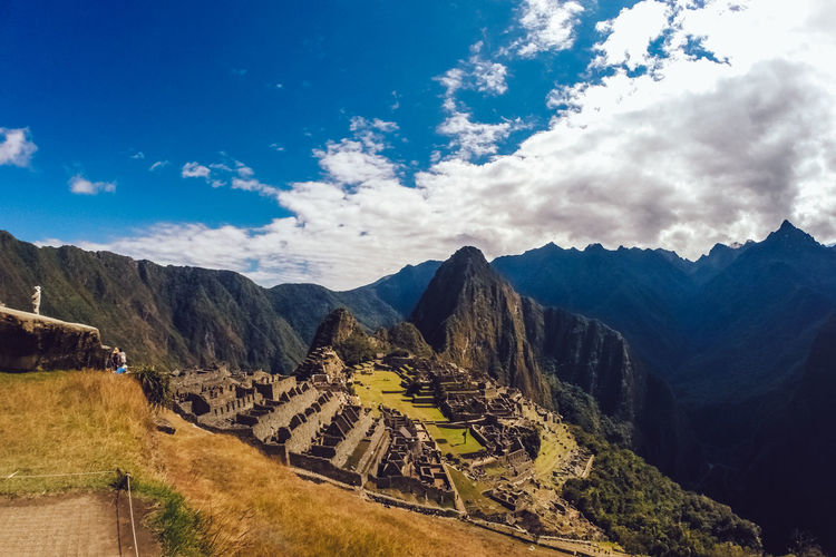 Scenic view of machu picchu against cloudy sky