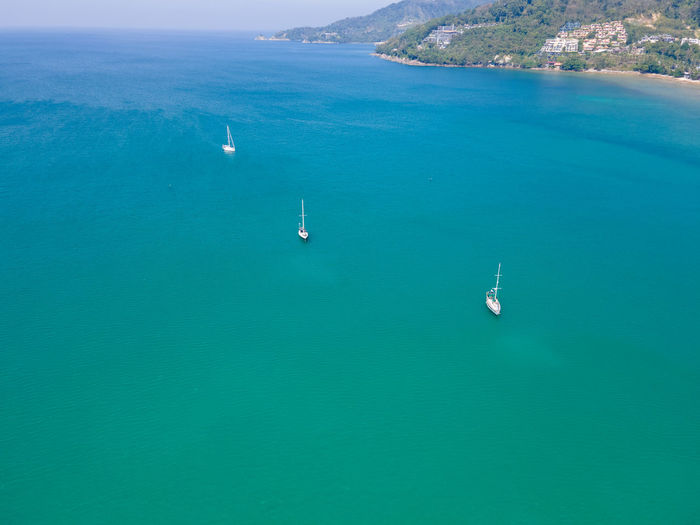 High angle view of sailboat in sea