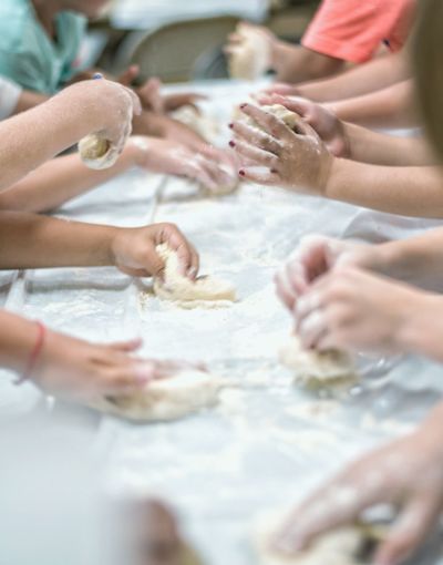 Close-up of hands preparing food
