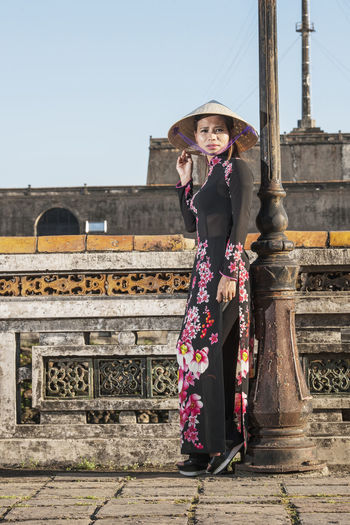 Beautiful woman at the imperial fortress in hue / vietnam