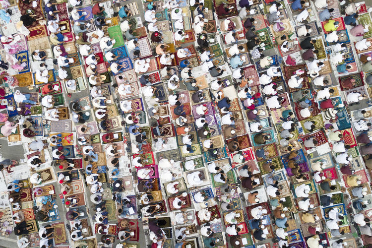 Full frame shot of people praying in city