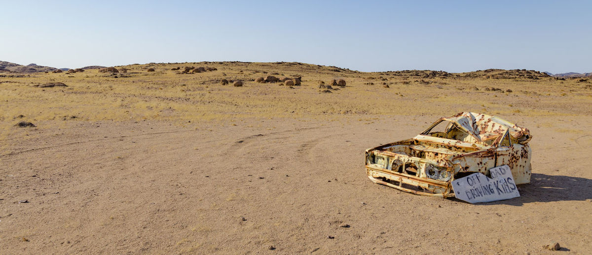 Car wreck in the landscape of damaraland, a part of namibia