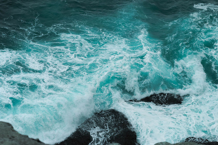 Waves splashing on rocks