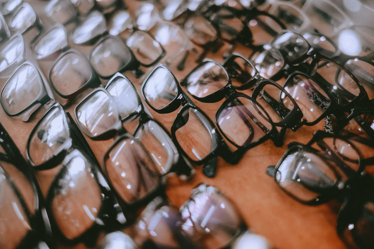 High angle view of reading glasses on the display counter