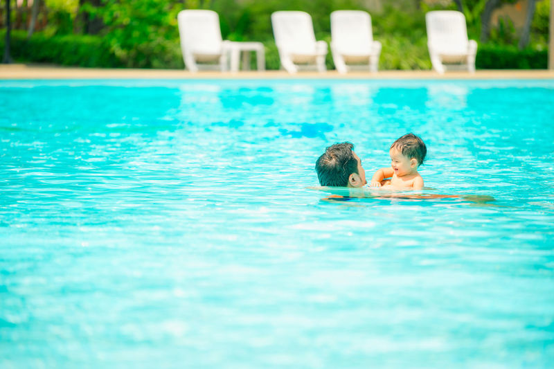 People swimming in pool
