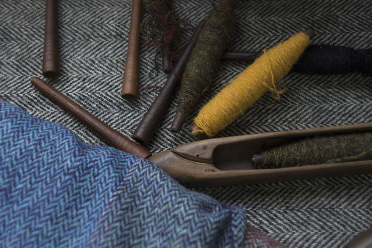 High angle view of knitting tools