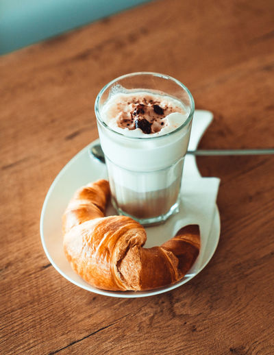 High angle view of coffee cup on table