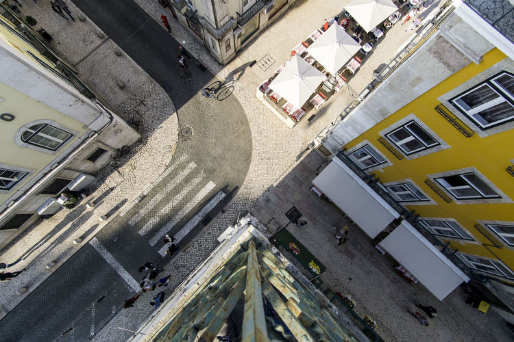 High angle view of street amidst buildings in city