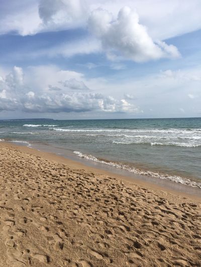 Scenic view of beach against sky
