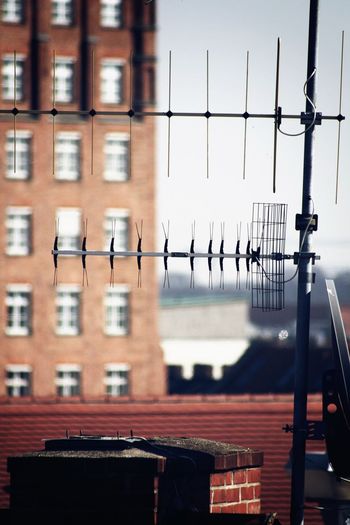 Close-up of antenna on top of building