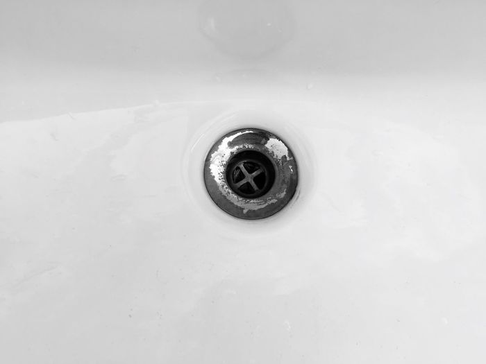Close-up of water faucet in bathroom
