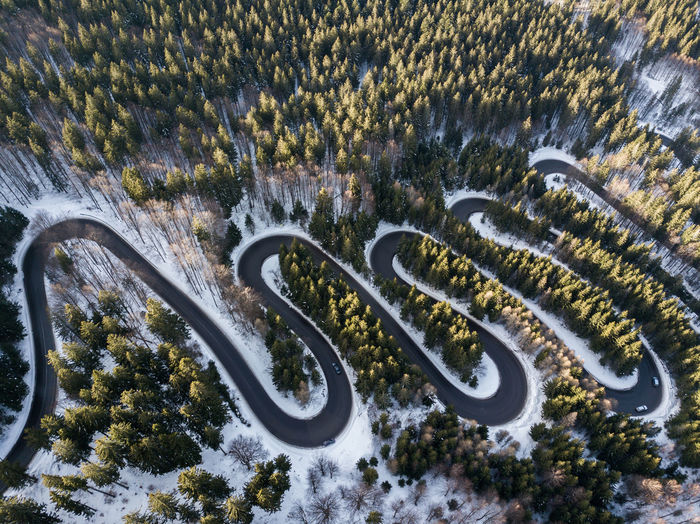 High angle view of bicycle on snow covered road