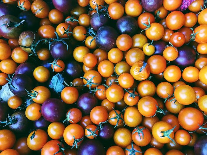 Full frame shot of cherry tomatoes at market stall