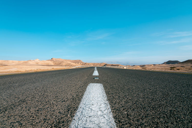 Surface level of road against sky