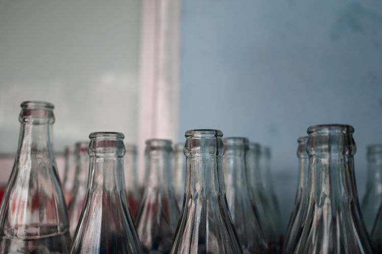 Close-up of bottles against blurred background