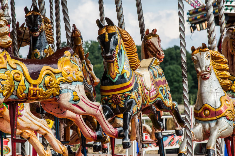 Carousel horses at amusement park