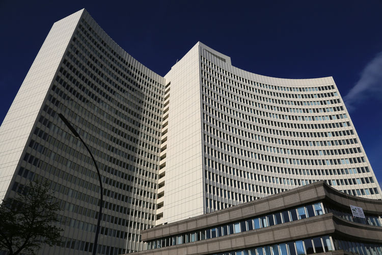 Low angle view of modern buildings against clear sky