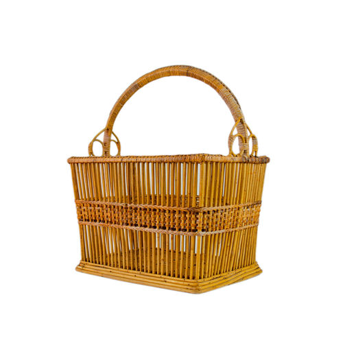 Close-up of yellow basket against white background