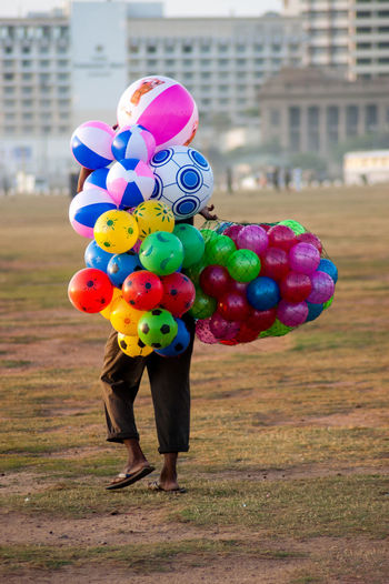 Full length of multi colored balloons