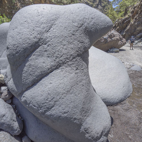 Close-up of man sculpture on rock