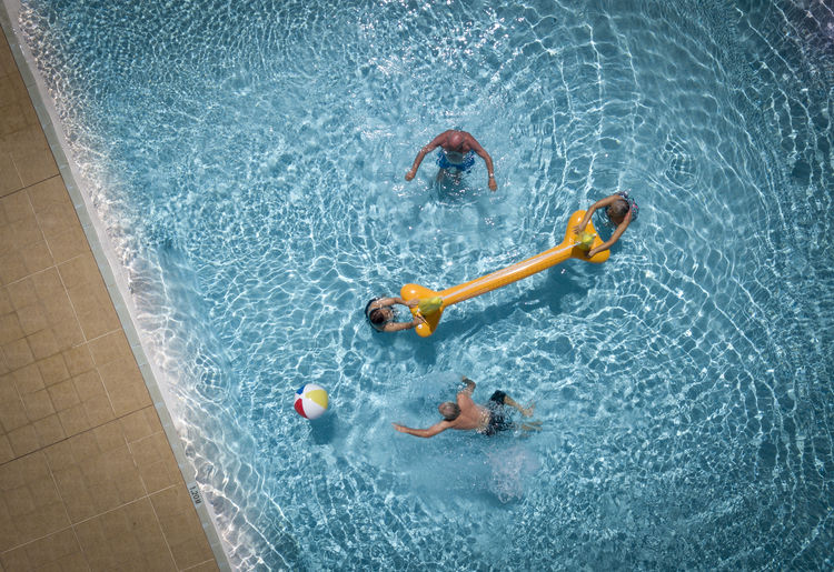 People swimming in pool