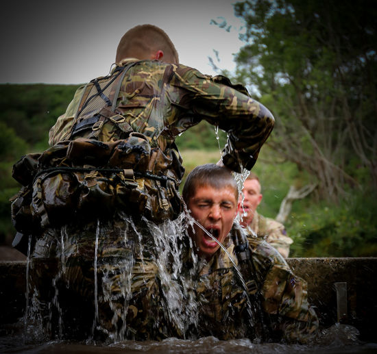 Army soldiers practicing in water
