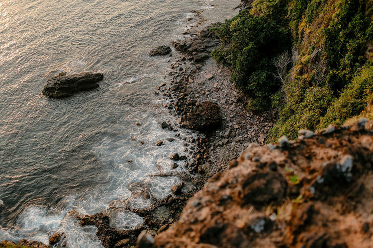 High angle view of water on rock in sea