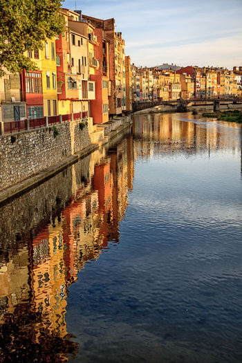 View of canal with buildings in background