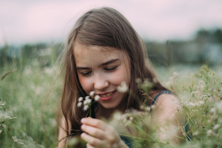 Portrait of a girl in a field