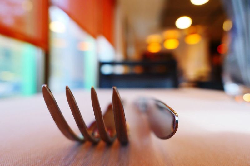 Close-up of fork and knife on table