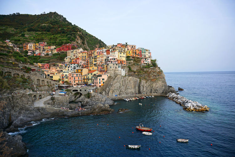 Scenic view of manarola against sky