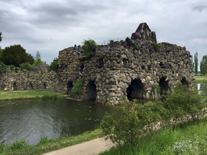 View of old ruin building against cloudy sky