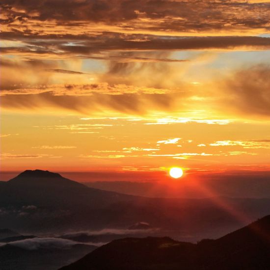 Scenic view of landscape against sky during sunset