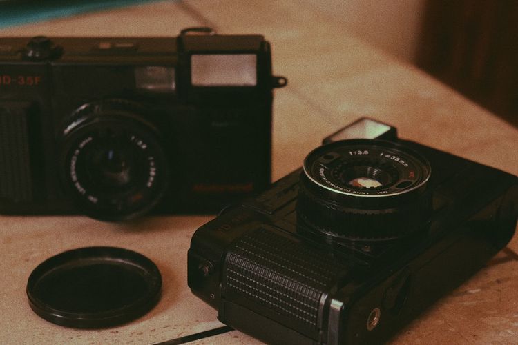 High angle view of camera on table