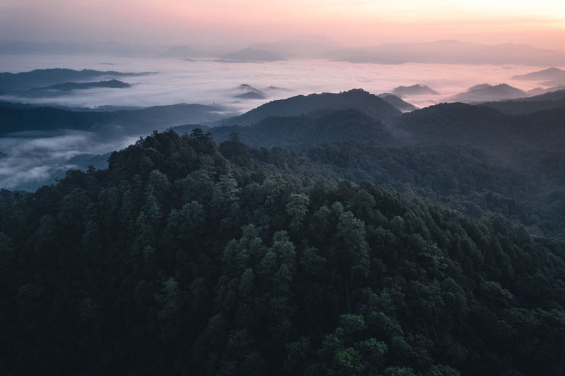 Scenic view of mountains against sky during sunset