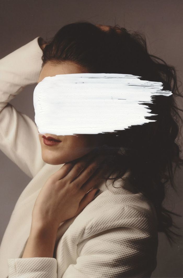 Close-up of woman with obscured face