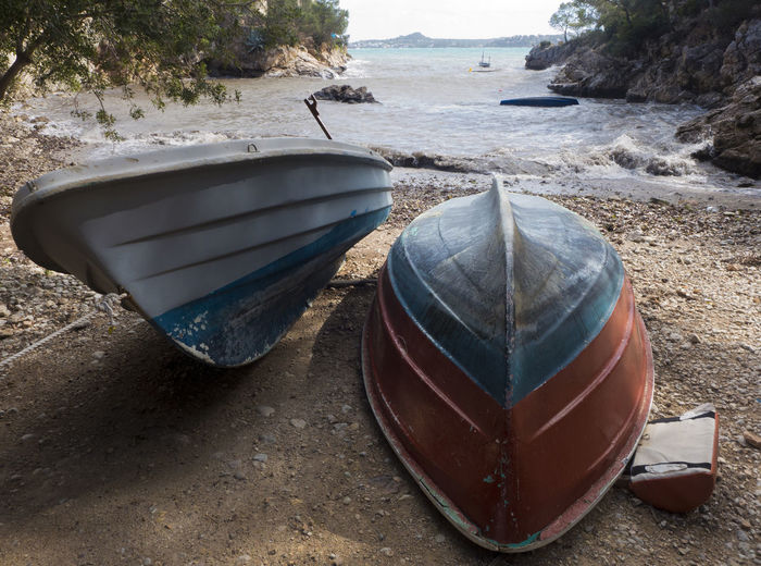 High angle view of boat moored on beach