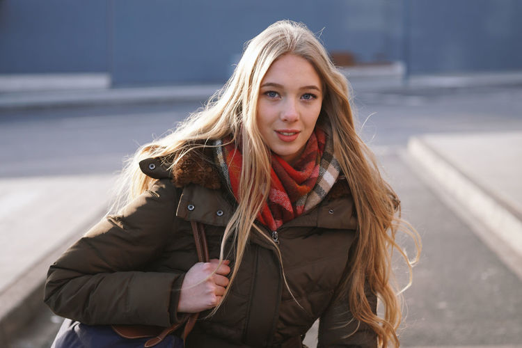 Portrait of beautiful young woman in winter