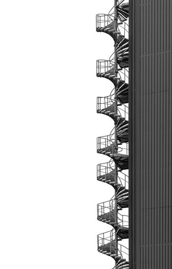 Low angle view of modern building against white background