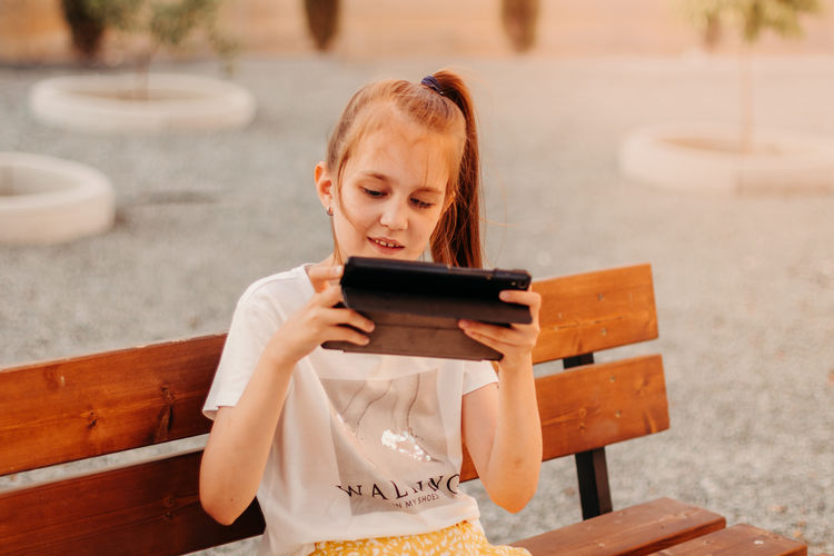 Young woman using mobile phone