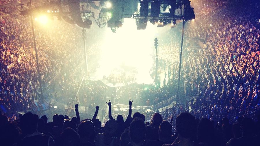 Rear view of people enjoying music concert