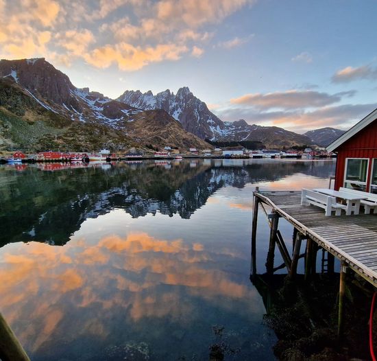 Scenic view of lake against sky during sunset from rorbu in lofoten, norway